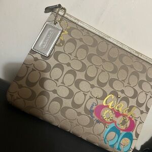 Coach Daisy Poppy Signature tablet sleeve